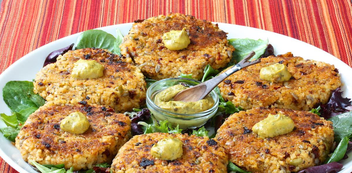 manhatten millet cakes on a bed of lettuce